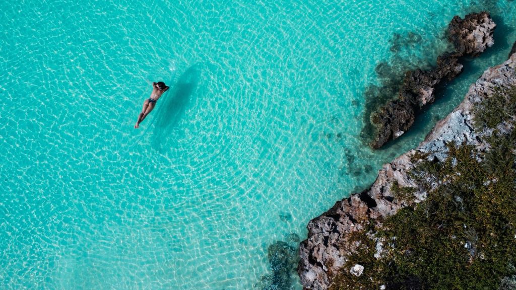 Woman floating in the Turks & Caicos